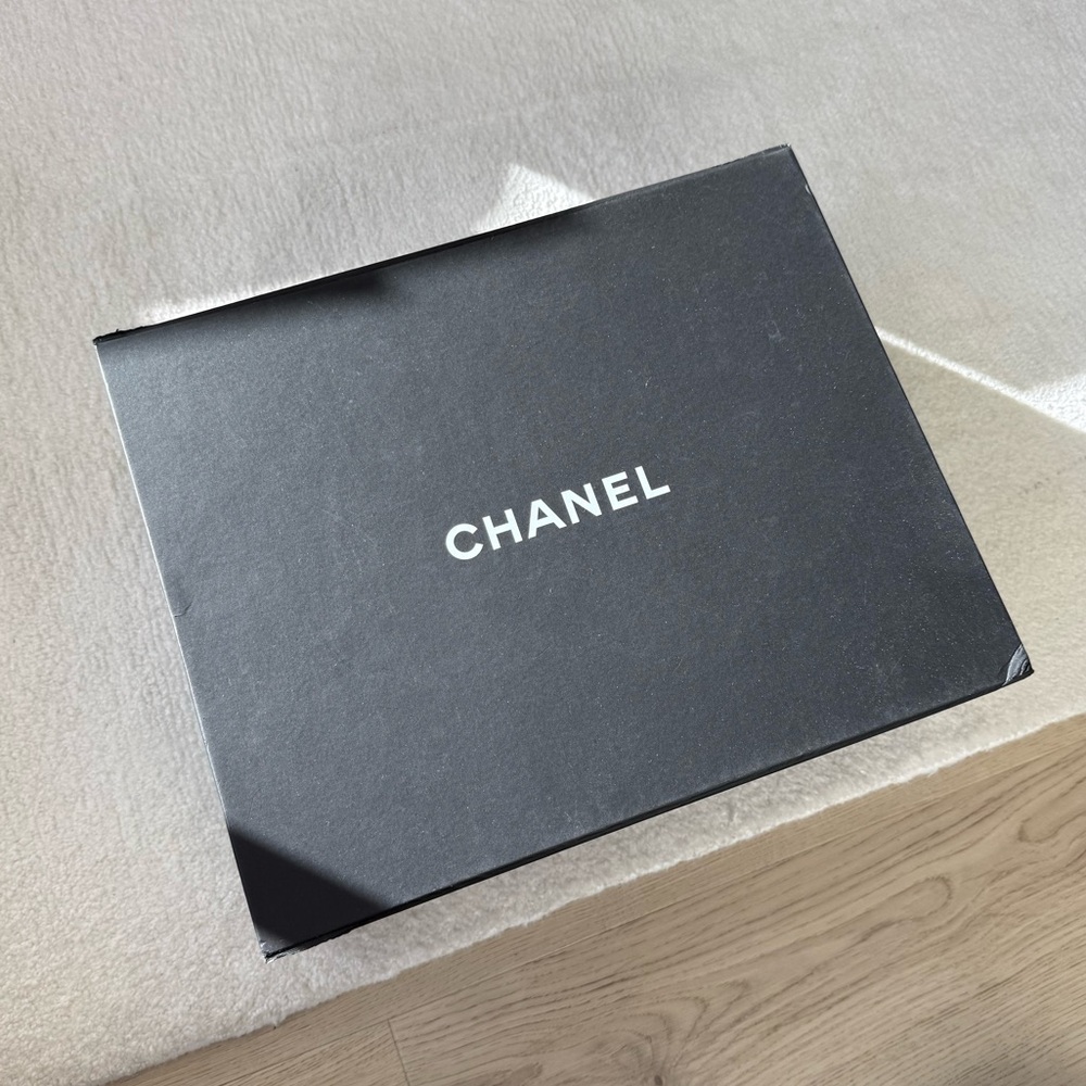 CHANEL Classic Sneakers in Ivory/White
Calfskin Suede + Gold Chanel Logo - Picture 8 of 9